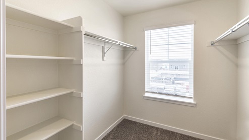 Elder Primary Bedroom Walk in Closet  at Looking Glass by D.R. Horton