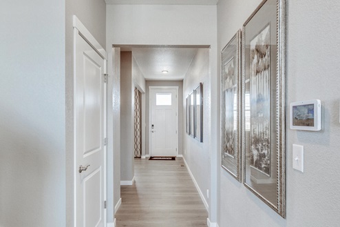 spacious entry way with decorated walls