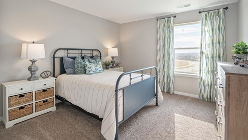 Hennessy Fourth Bedroom at Trails at Crowfoot by D.R. Horton
