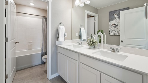 Hennessy Full Bathroom at Trails at Crowfoot by D.R. Horton