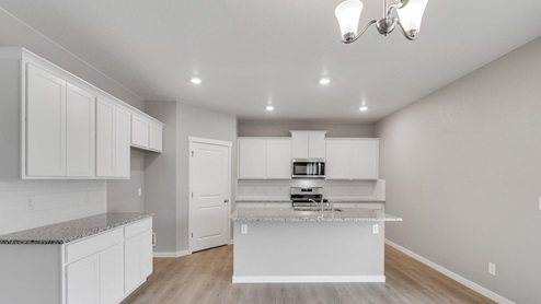 kitchen with white cabinet