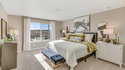 staged carpet floor bedroom with a window and ceiling light
