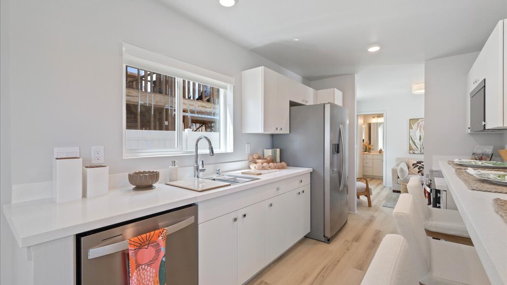 Interior walkthrough kitchen with bar counter