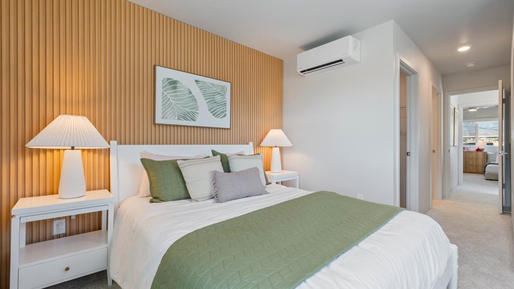 Interior bedroom with large window with ensuite bathroom