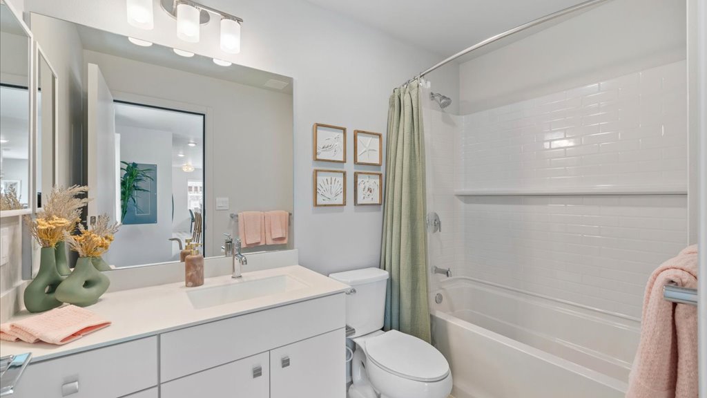 Interior bathroom with toilet vanity and walk in shower