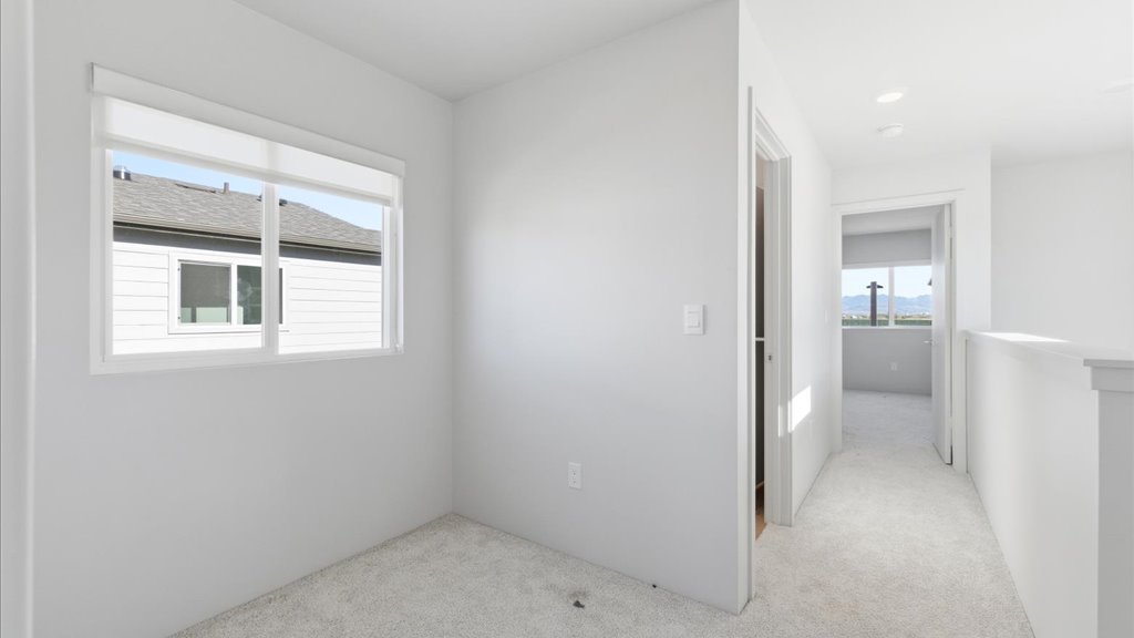 Interior bonus space with large window open to bathroom