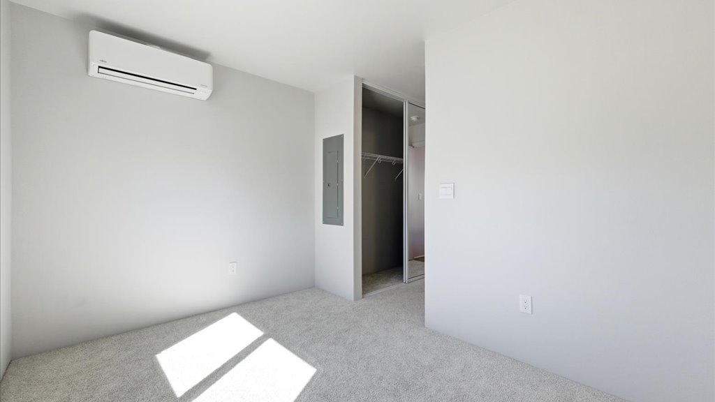 Interior bedroom with sliding door closet
