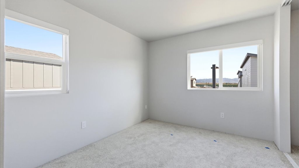 Interior bedroom with large window
