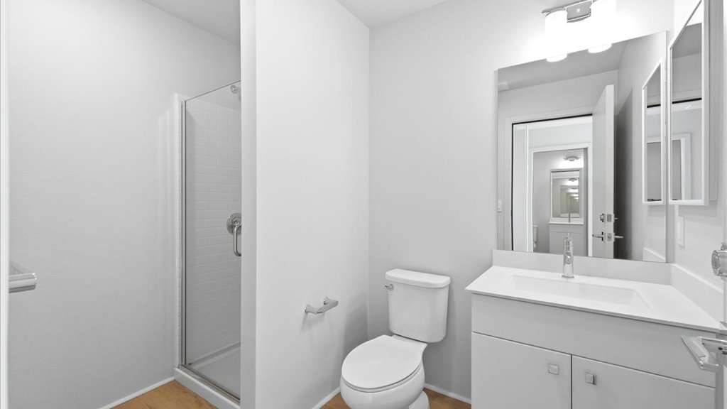 Interior bonus space with large window open to bathroom