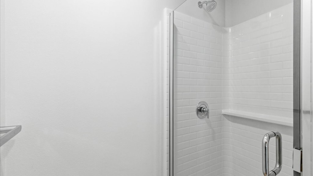 Interior bonus space with large window open to bathroom