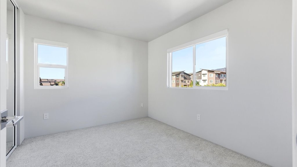 Interior bedroom with large window