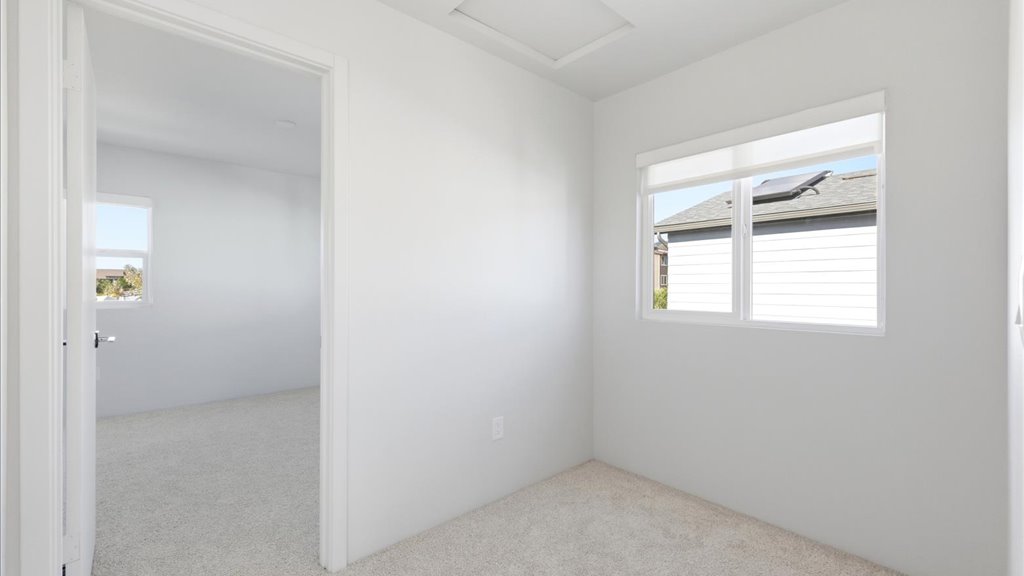 Interior bonus space with large window open to bathroom