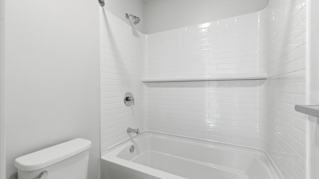 Interior bathroom with shower and tub combination