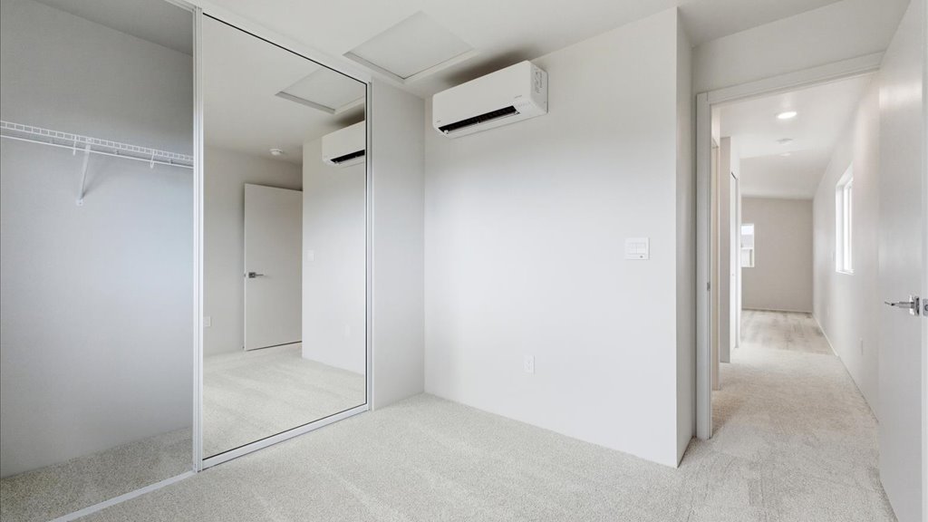 Interior bedroom with sliding doors closet