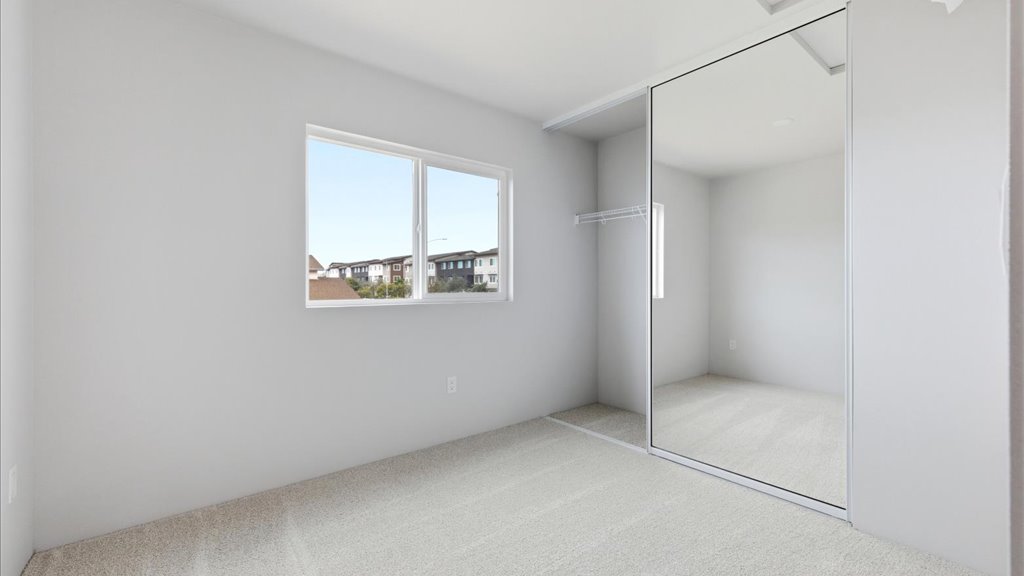 Interior bedroom with sliding door closet