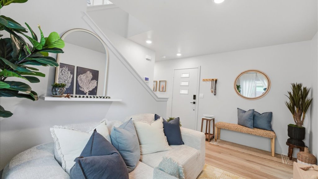 Interior bonus space with large window open to stairs