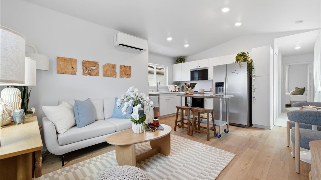 Interior bonus space with large window open to stairs