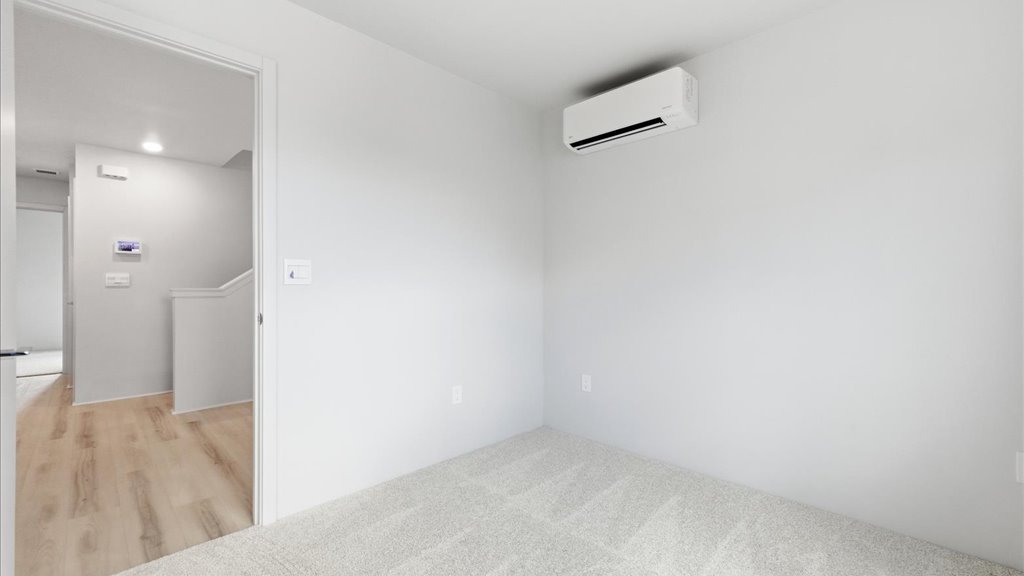 Interior bedroom open to bonus space