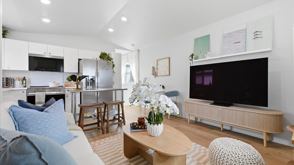 Interior living room open to the kitchen