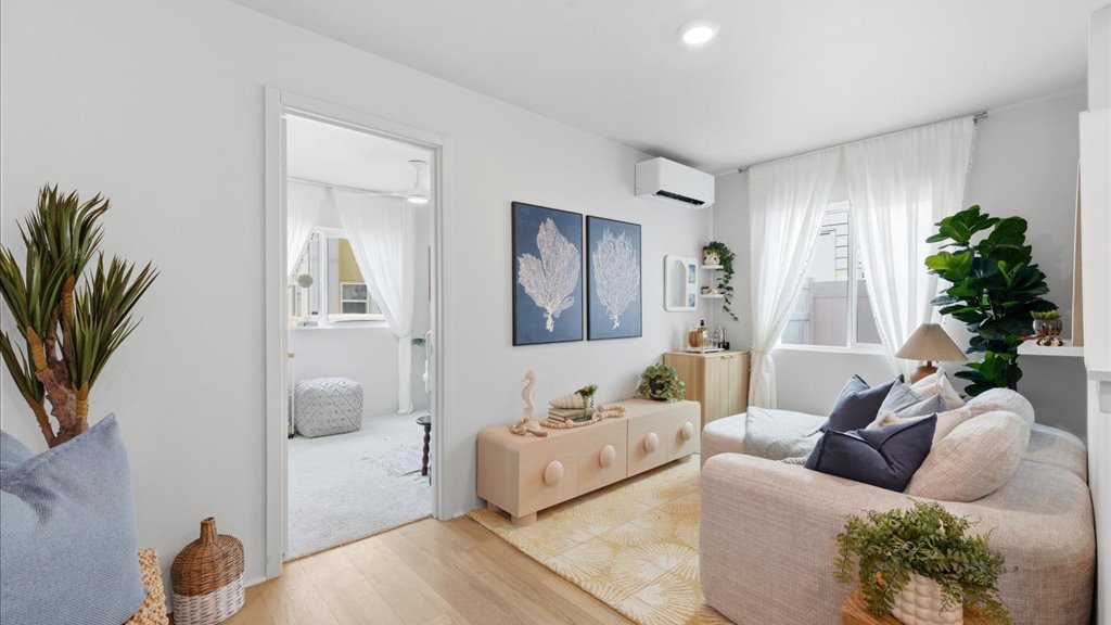 Interior bonus space with large window open to stairs