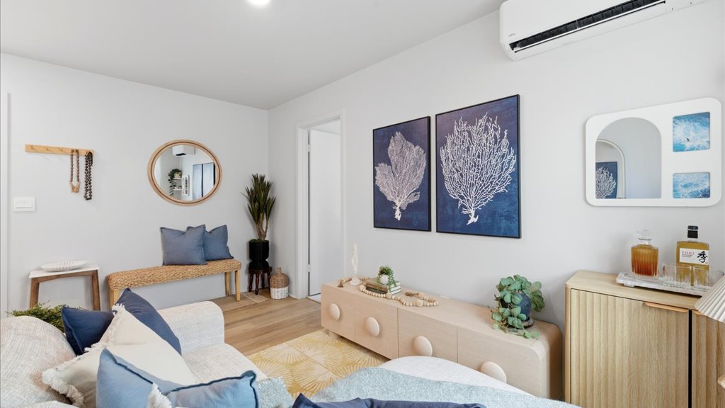 Interior bonus space with large window open to stairs Interior hallway with storage space