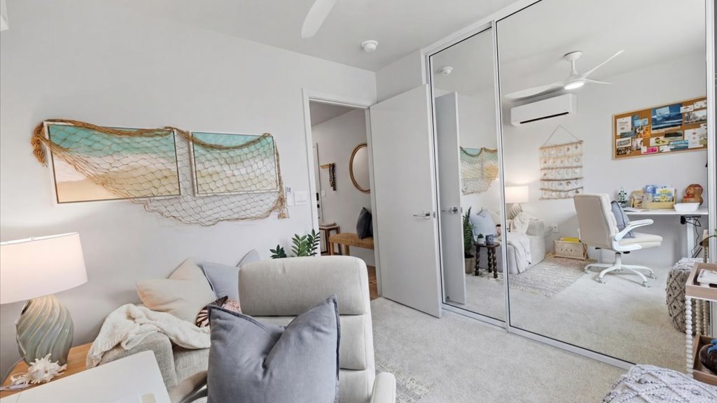 Interior bedroom with mirror sliding door closet