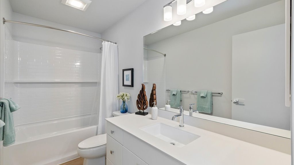Interior bathroom with shower and tub combination