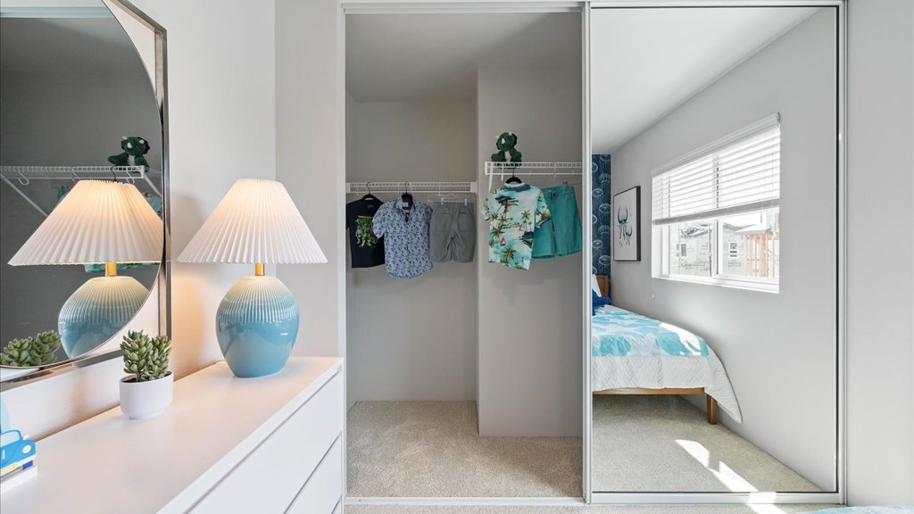 Interior bedroom with sliding door closet