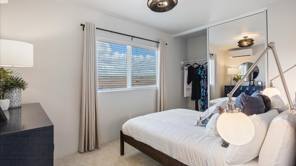 Interior bedroom with sliding door closet