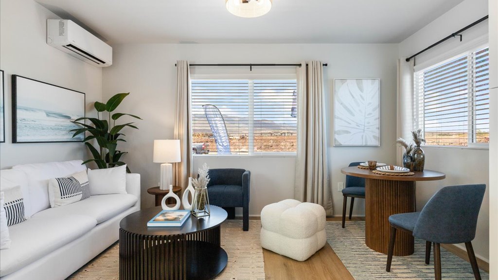 Interior living room and dining area with large windows
