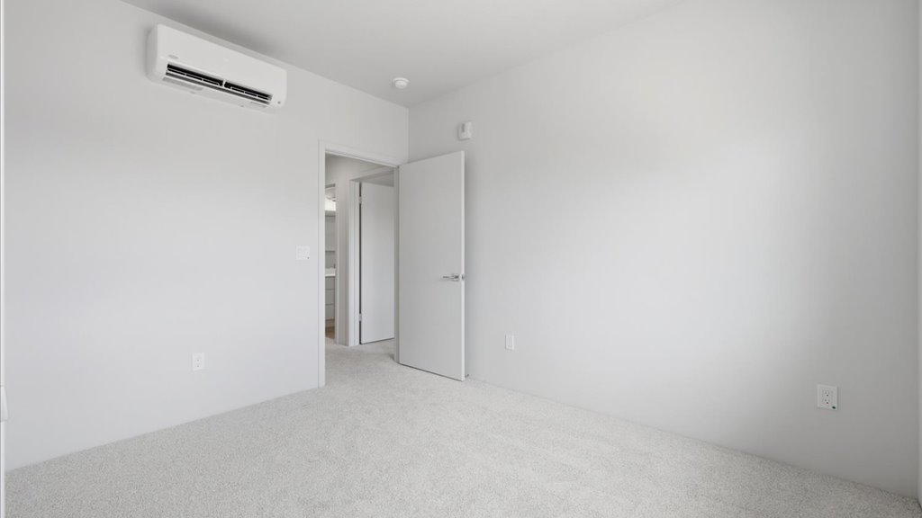 Interior bedroom with sliding closet doors