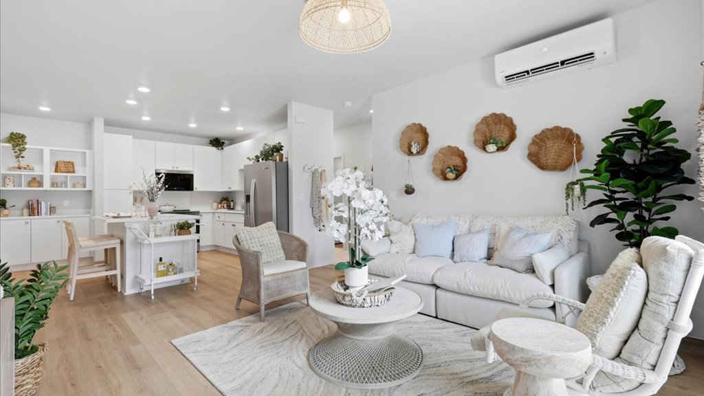 Interior living room open to kitchen and lanai