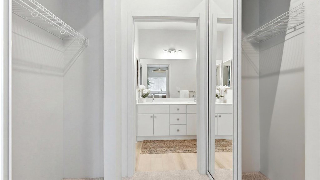Interior bedroom walk in closet