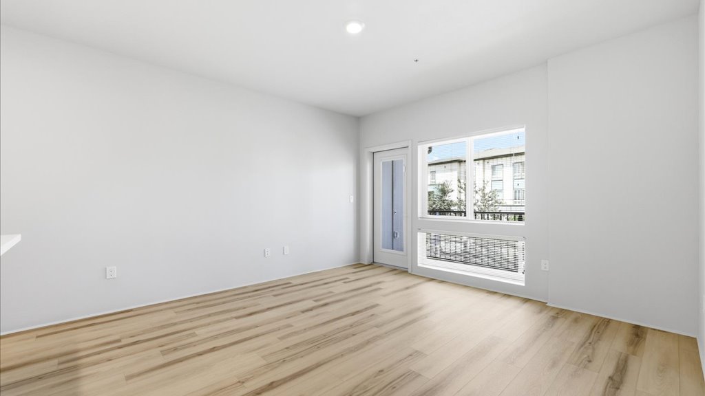 Interior living room open to kitchen and lanai