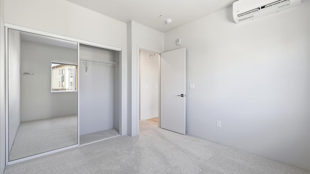 Interior bedroom with sliding door closet