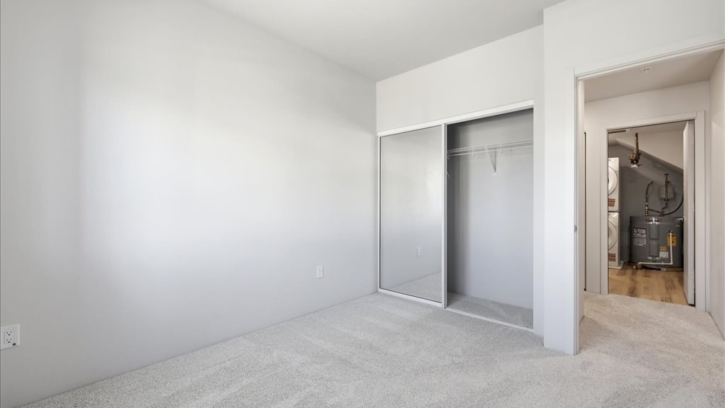 Interior bedroom with sliding door closet
