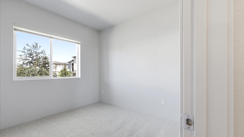 Interior bedroom with large window