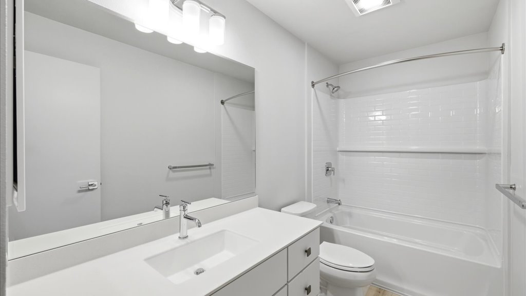 Interior shower tub and toilet and vanity sink