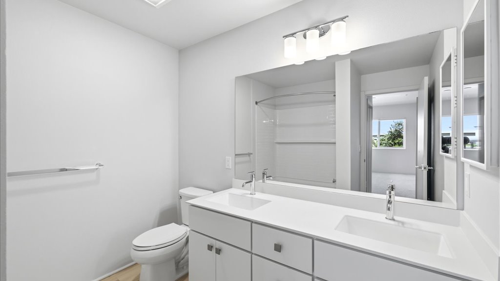 Interior shower tub and toilet and vanity sink