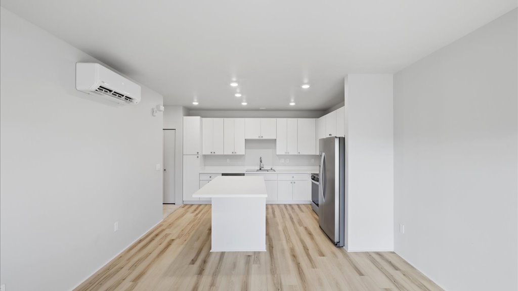 Interior living room open to kitchen