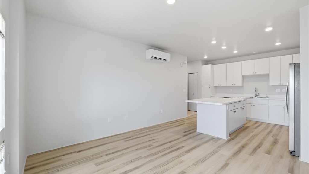Interior living room open to kitchen