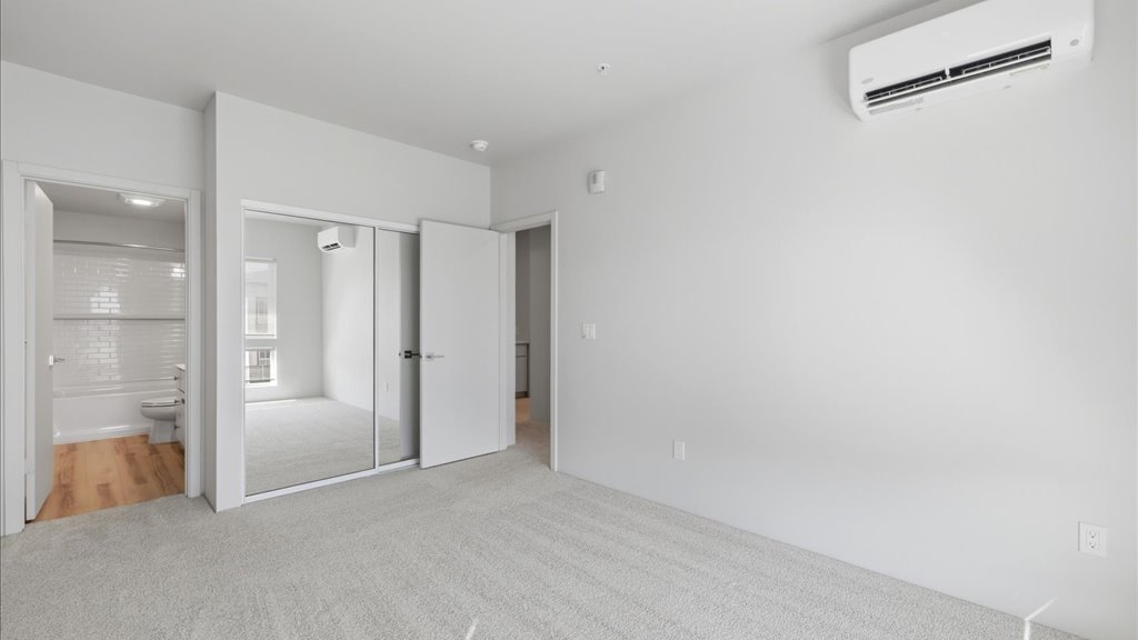 Interior bedroom with sliding door closet