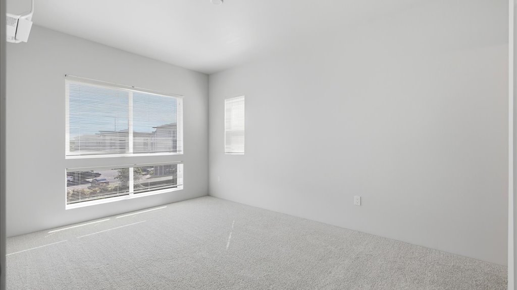 Interior bedroom with large window
