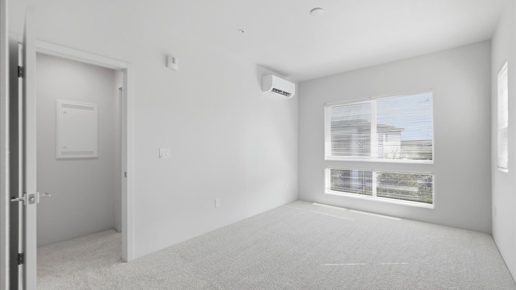 Interior bedroom with large window