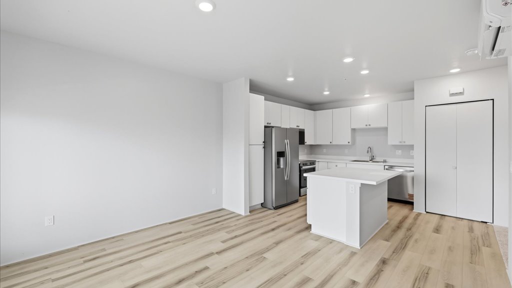 Interior living room open to kitchen