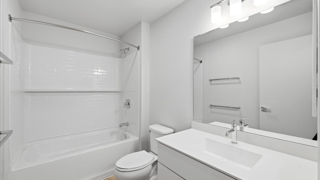 Interior bathroom with vanity sink toilet and shower