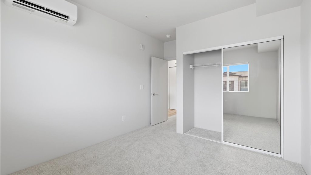 Interior bedroom with sliding door closet
