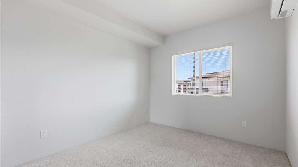 Interior bedroom with large window