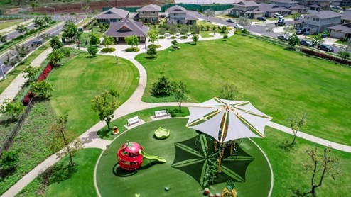 Community amenity park with slides and shaded covering