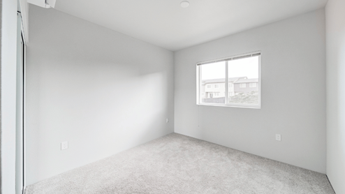 Interior bedroom with large window